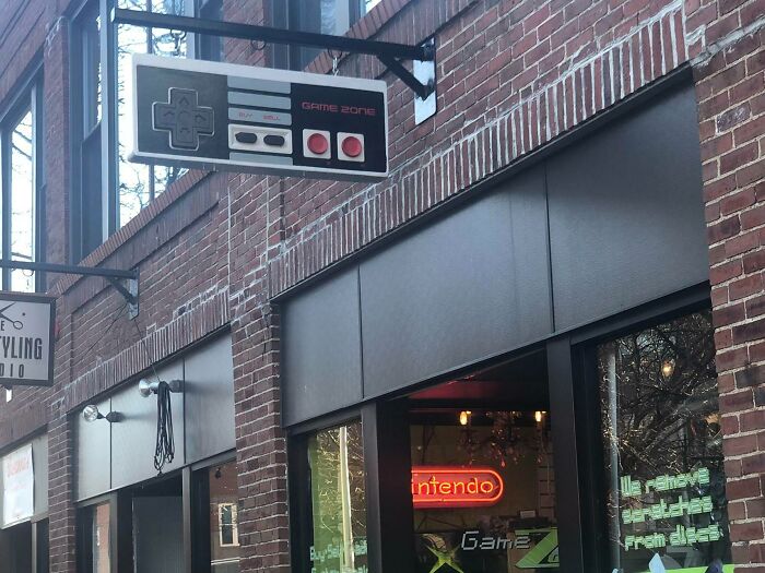 Video Game Store Sign Shaped Like NES Controller