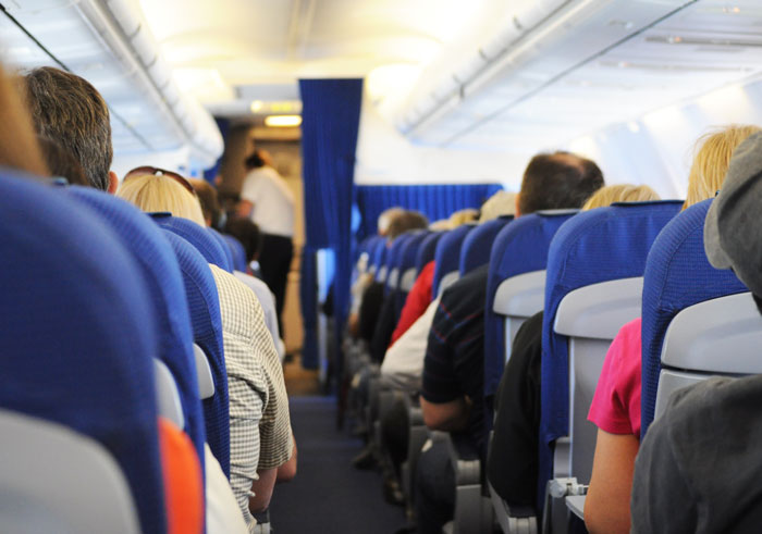 People sitting in the plane seats