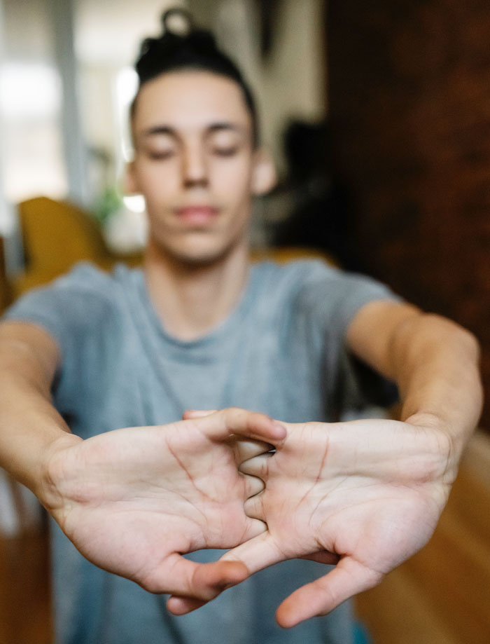 Person cracking knuckles