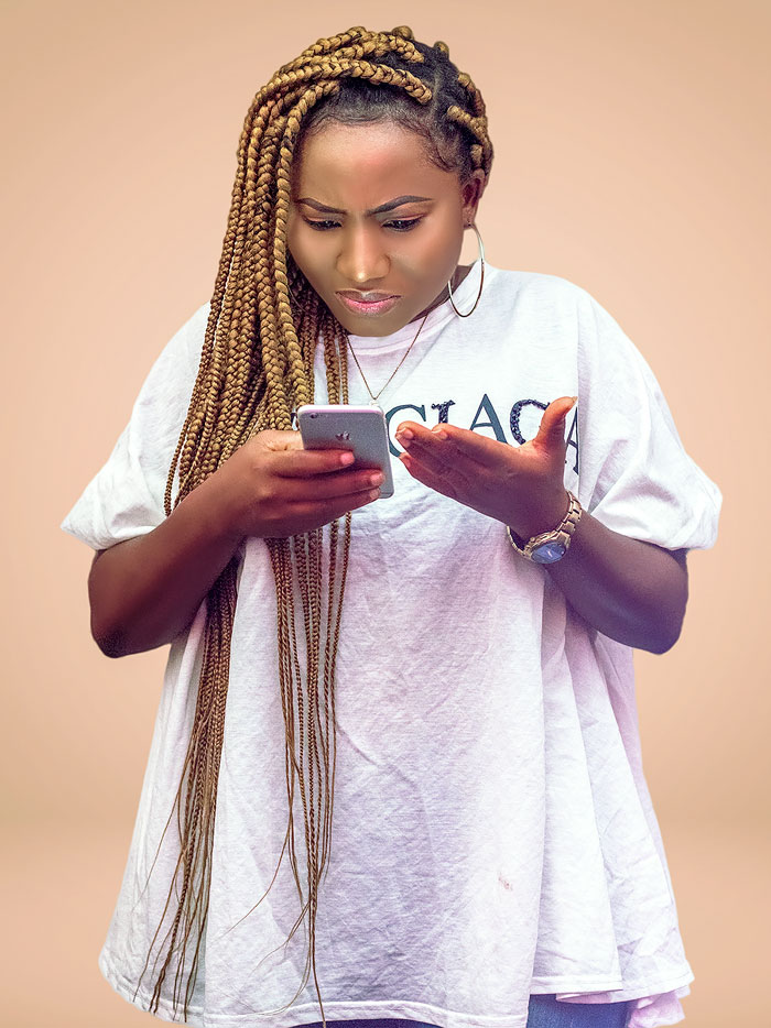 Woman confused watching on their phone