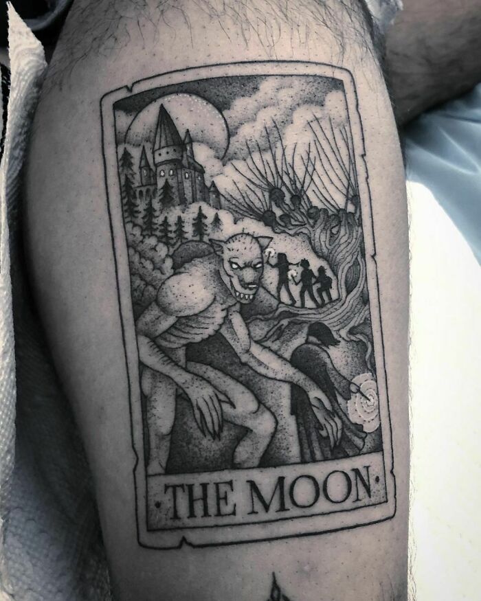 Harry Potter tattoo featuring a werewolf under a full moon, with Hogwarts in the background, inspired by "The Moon" tarot card.