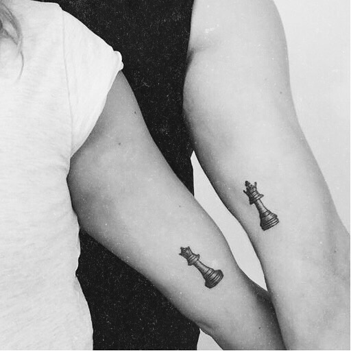 Chess game inspired matching tricep tattoos