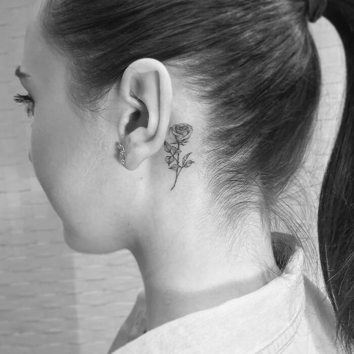 ear tattoo of a rose