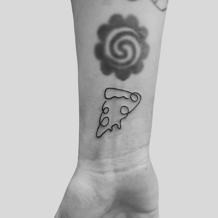 Single line pizza wrist tattoo