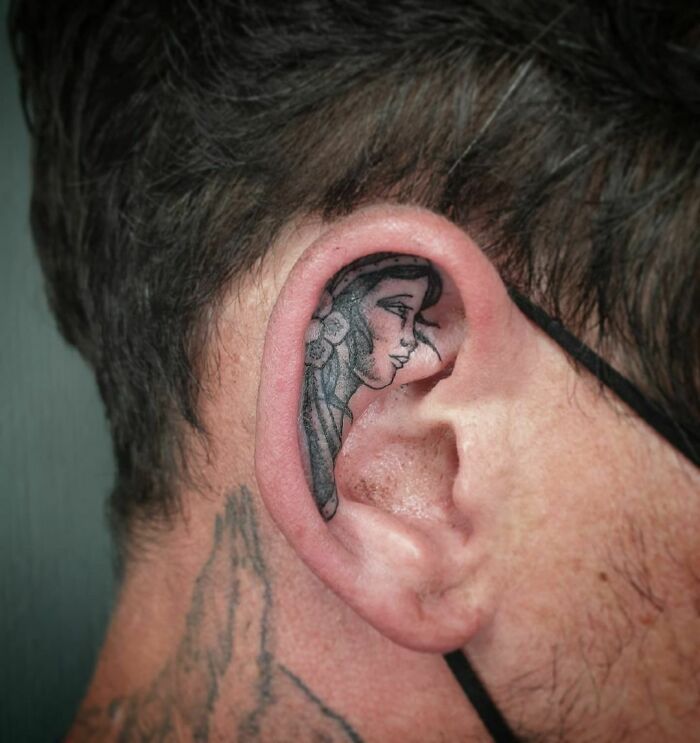 ear tattoo of a woman
