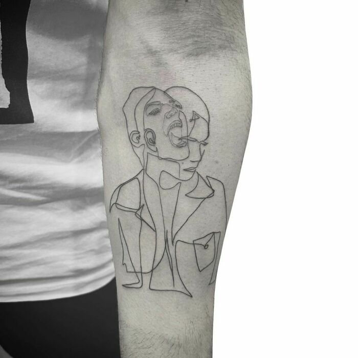 Line person screaming arm tattoo