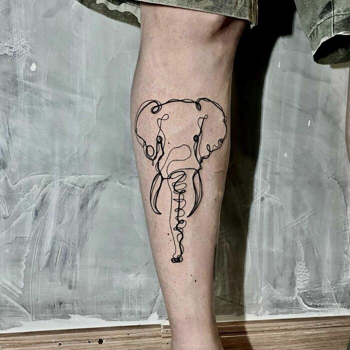 Single line elephant leg tattoo