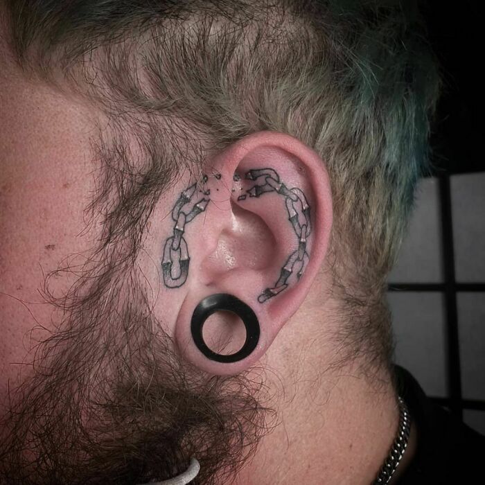 ear tattoo of a chain