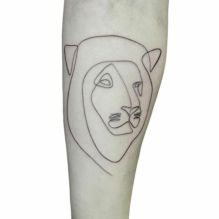 Single line lion head tattoo