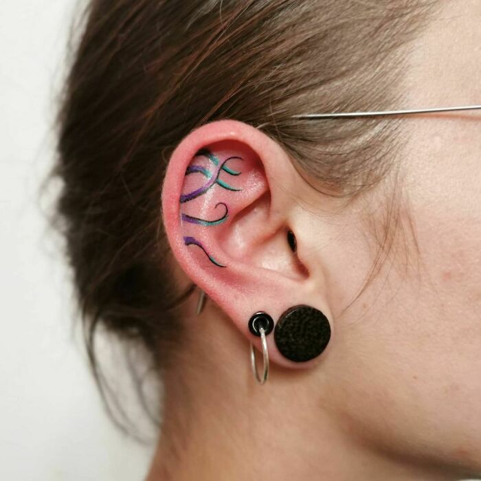 ear tattoo of octopus tentacles
