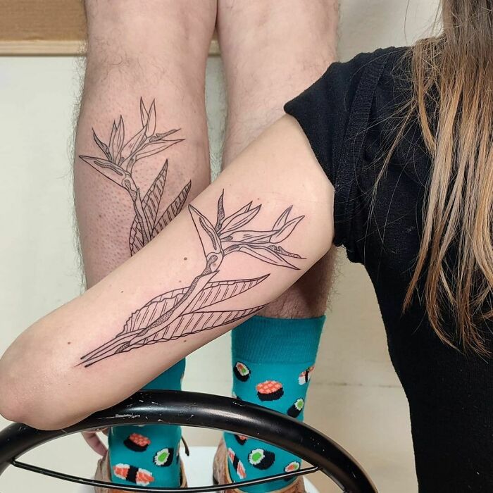 Exotic flower matching tattoos