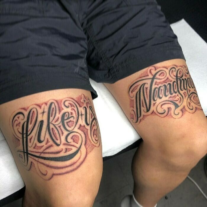 Word tattoos on thighs read "Life's a Journey."