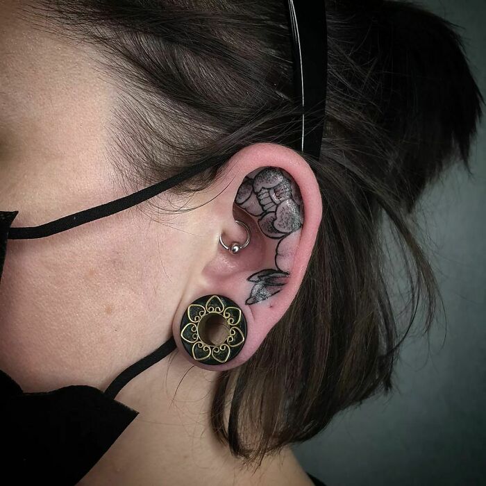 ear tattoo of a peony