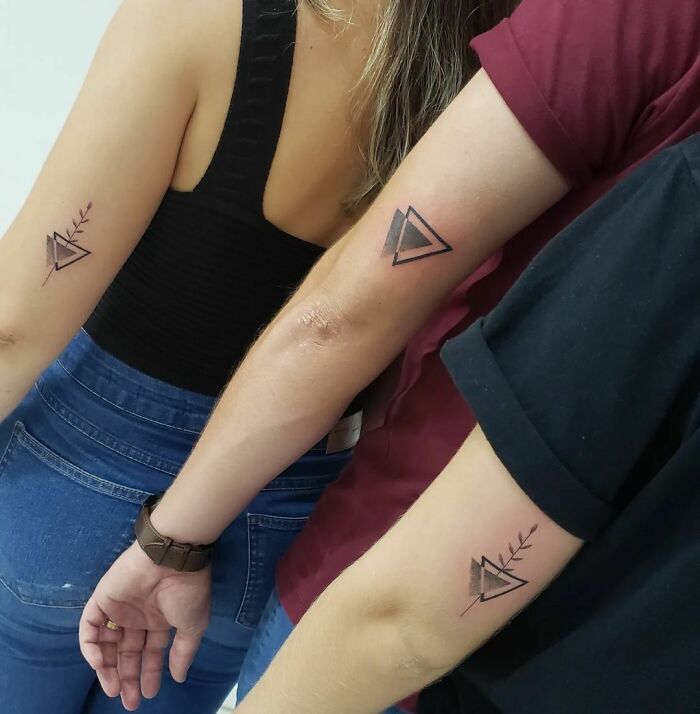 Triangle matching elbow tattoos