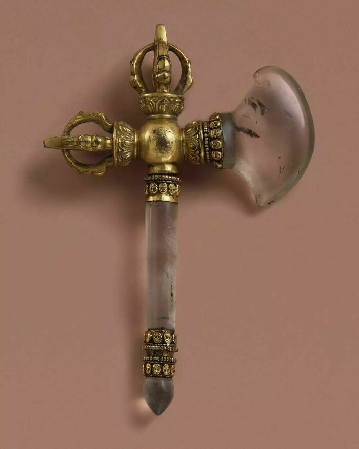 Ritual Axe Decorated With Skulls And Crown Motifs. It's Made From Gilded Bronze And Rock Crystal. Kham Region. Derge, Tibet Or China. 16th To 17th Century Ad