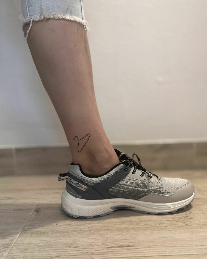 Single line ankle tattoo
