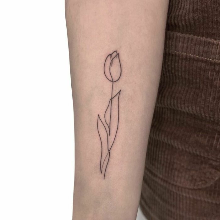 Single line tulip tattoo