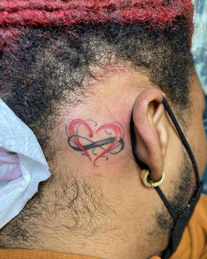 ear tattoo of an heart