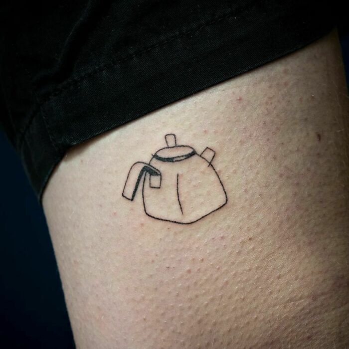 minimalistic tattoo of a tea kettle