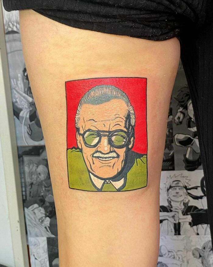 Stan Lee with red background tattoo