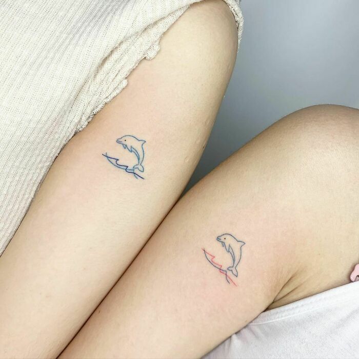 Matching Dolphin Tattoos