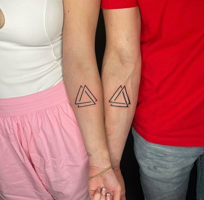 Triangle matching elbow tattoos