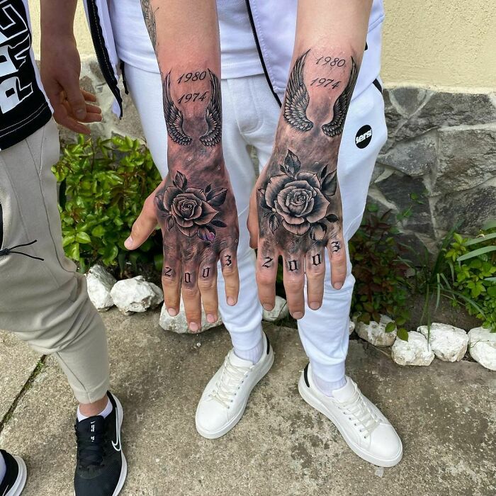 Rose with initials hand tattoos