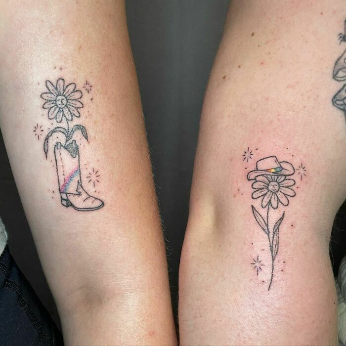 Matching cowboy boot and cowboy hat with flower tattoos