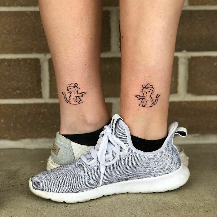 Matching cat tattoos on ankles symbolize best friend tattoos, showcasing unique friendship bonds.
