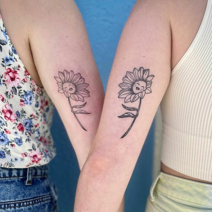 Best friend flower arm tattoos