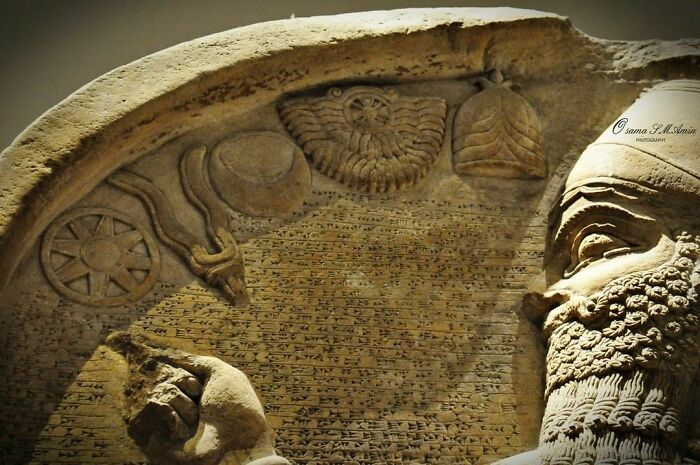Ashurnasirpal II Prays In Front Of God Symbols. A Close-Up View Of The Stela Of The Great Assyrian King Ashurnasirpal II, 9th Century Bce. The British Museum