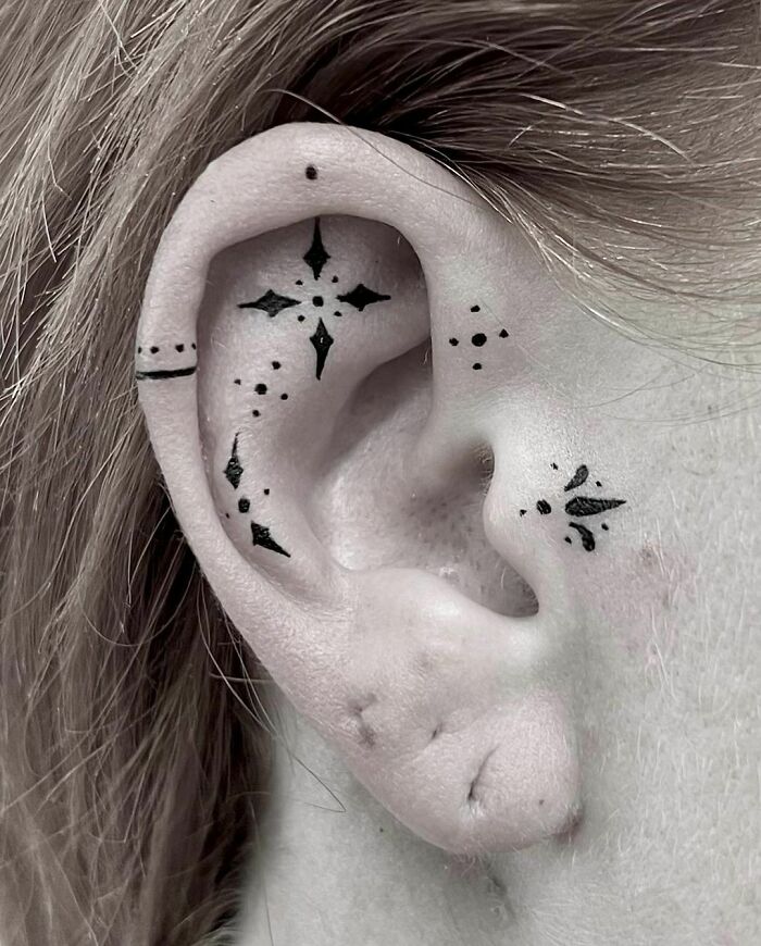 ear tattoo of an ornamental pattern