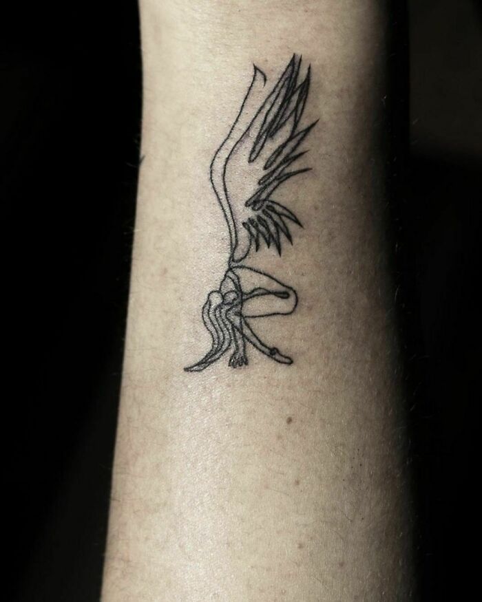 Single line woman with wings tattoo