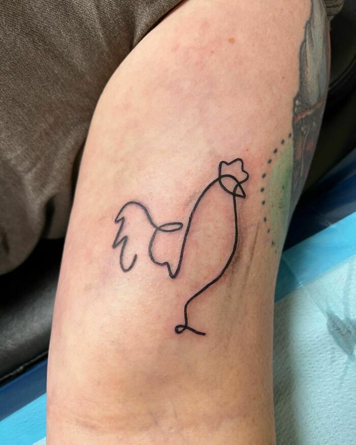 Single line rooster arm tattoo