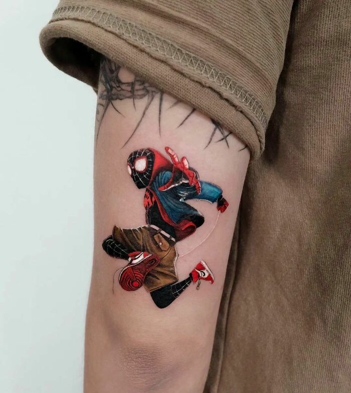 Miles Morales Spiderman arm tattoo