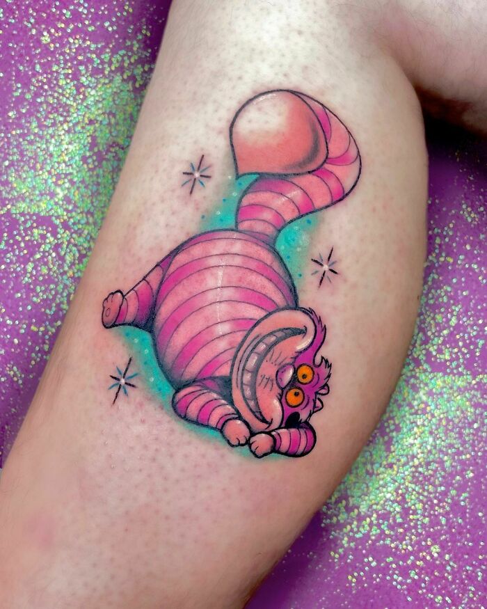 Colorful Cheshire Cat tattoo