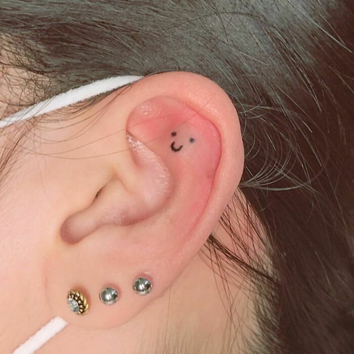 Smiley Face Tattoo