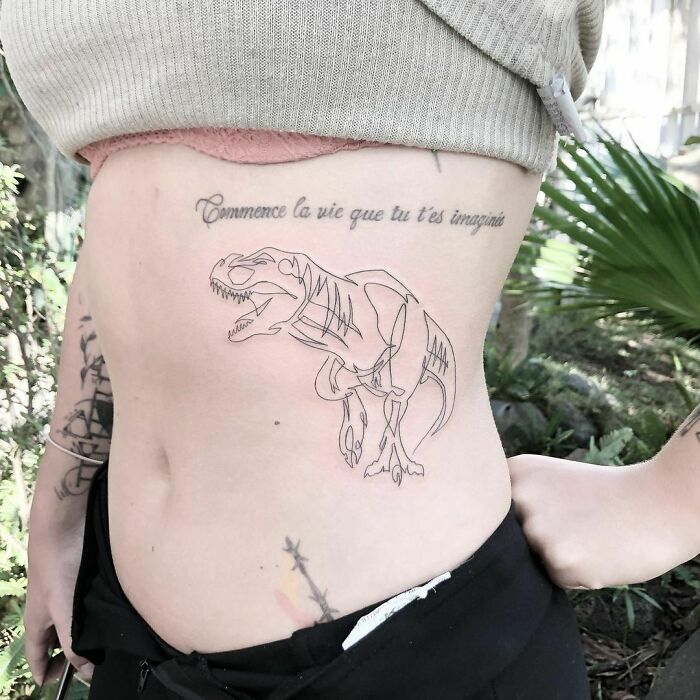 Single line dinosaur stomach side tattoo