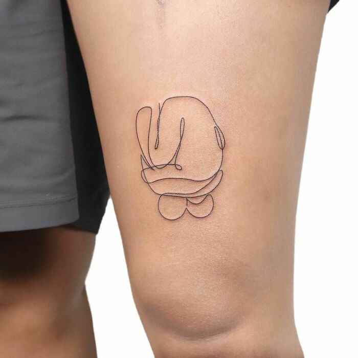 Single line symbol arm tattoo