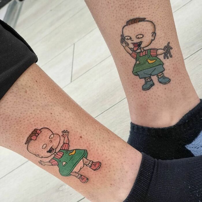 Rugrats characters Phil and Lil DeVille matching leg tattoos