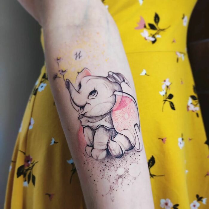 Dumbo arm tattoo