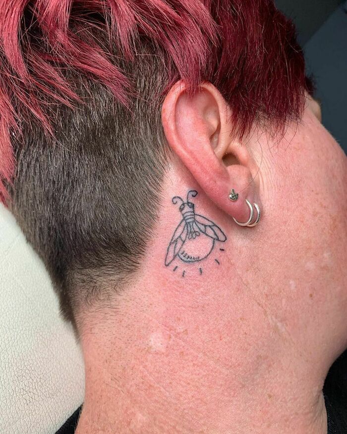ear tattoo of a bee