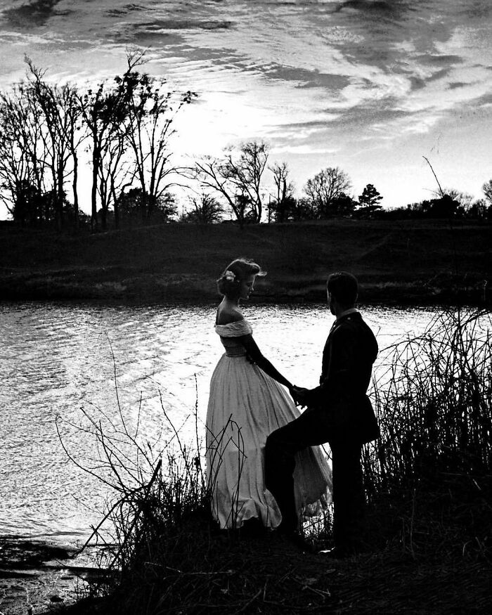 Couple Holding Hands On Banks Of The Tombigbee River Below Ante Bellum Riverview Mansion Where They Are Attending A Morale Boosting Party For Cadets At Nearby Army Flying Academy, 1948. Photo By Alfred Eisenstaedt