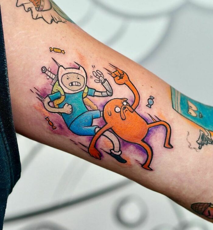 Adventure Time arm tattoo