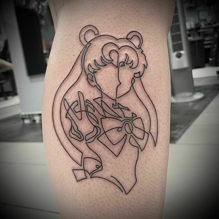 Single line Sailor Moon leg tattoo