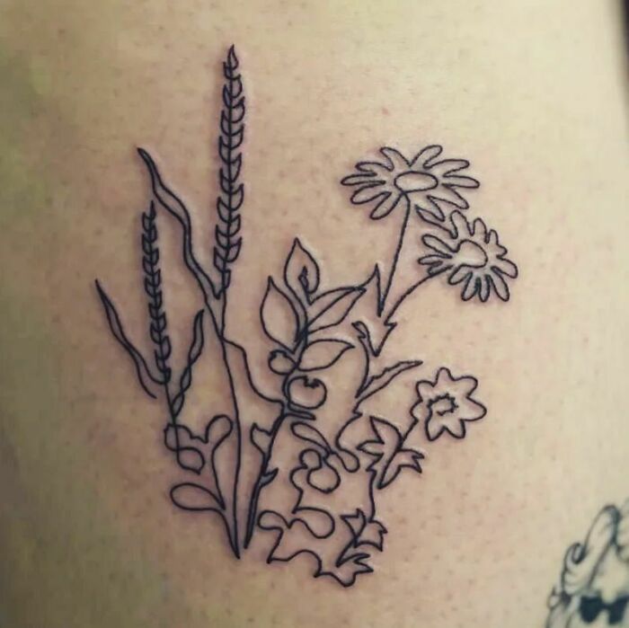 Single line flowers arm tatoo