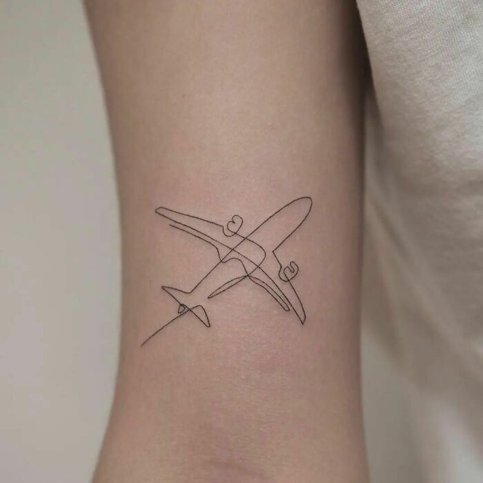 Single line flying airpalne tattoo