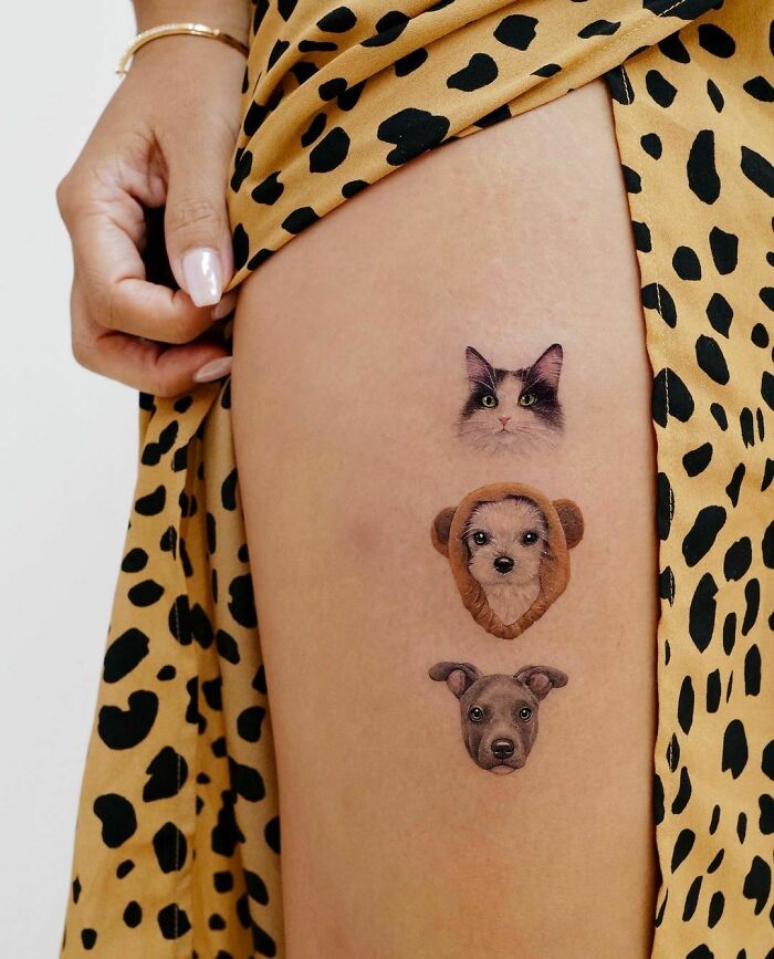 Kitten and two puppies tattoo 