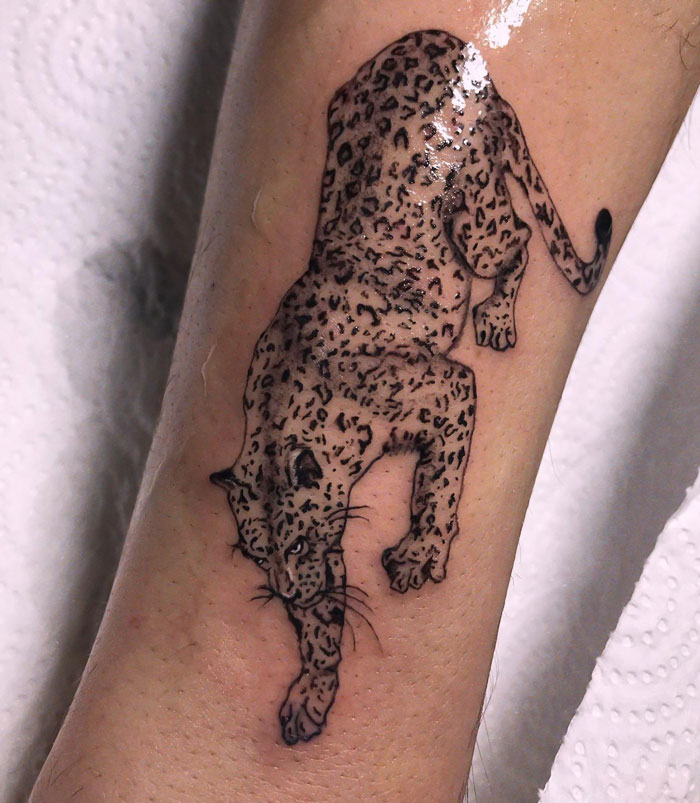 Walking leopard tattoo