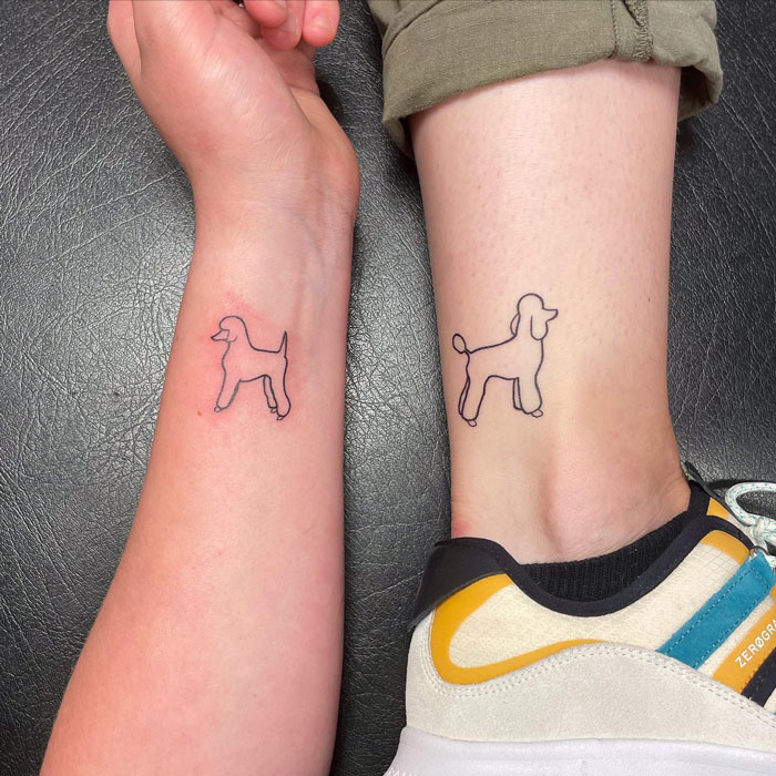 Minimalist poodle animal tattoos on forearm and ankle, showcasing simple line art design.